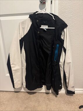 Columbia Black and White Hooded Ski Jacket with Blue Zip Accent